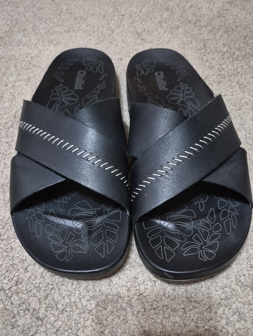 OluKai Black Crisscross Slide Sandals with Contrast Stitching